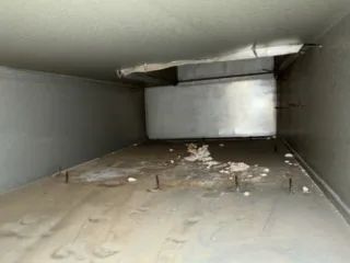 Inside a dirty air duct before cleaning, Shirley, NY